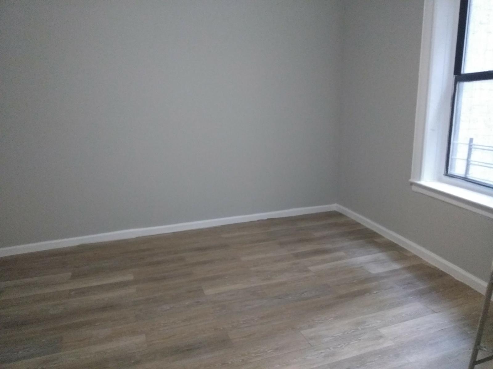 Empty room with wooden floor